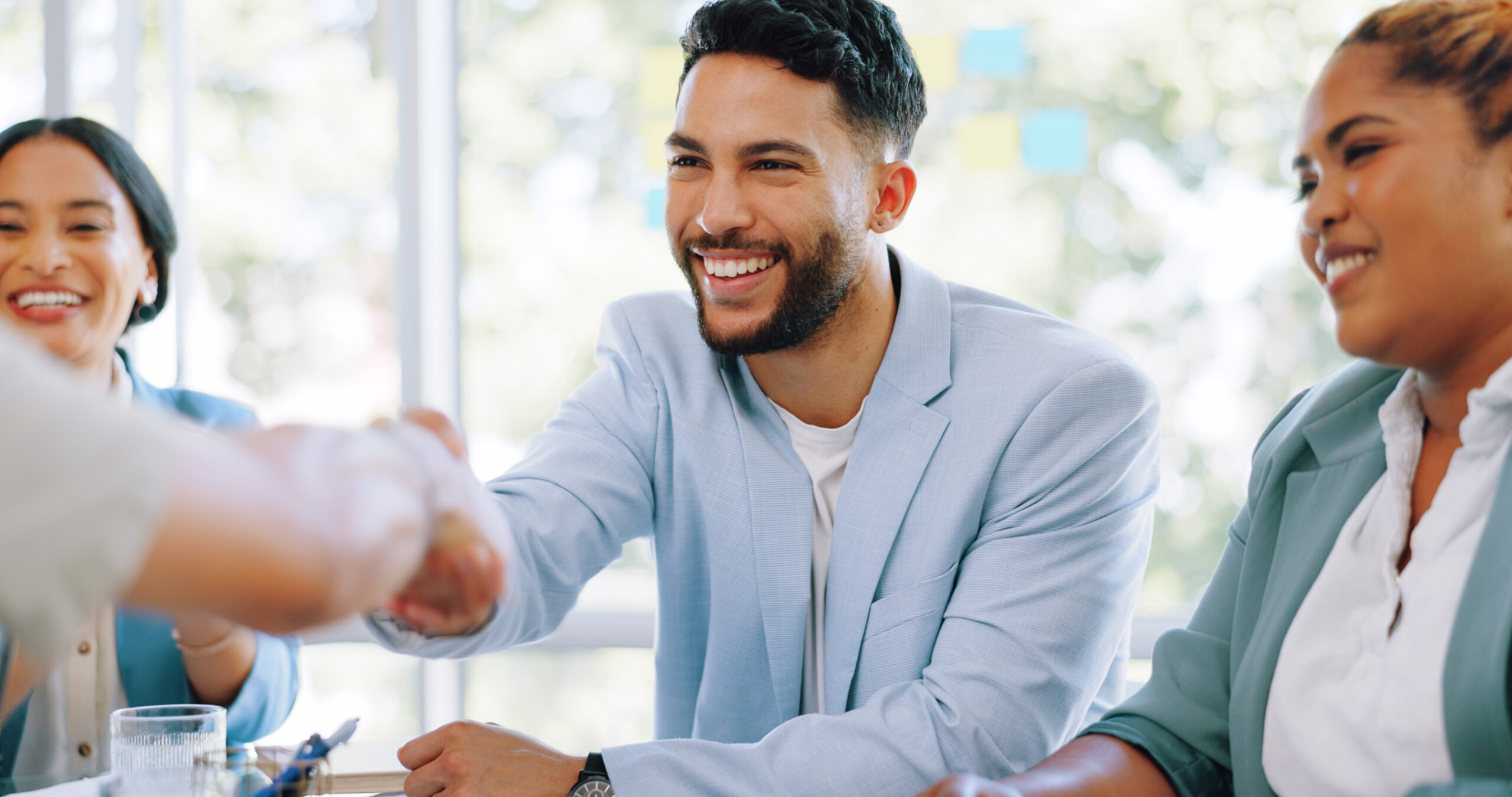 Candidate during interview process shaking hands